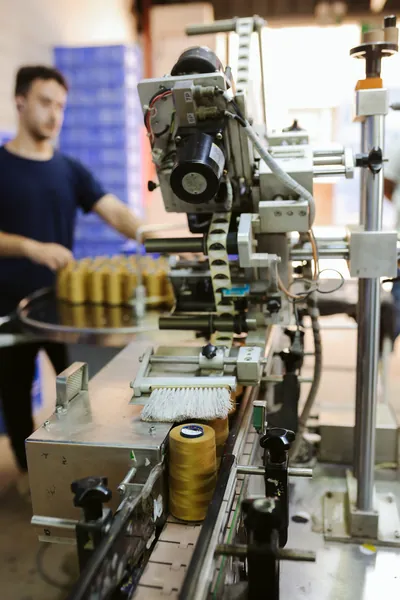 Cone finishing and labelling