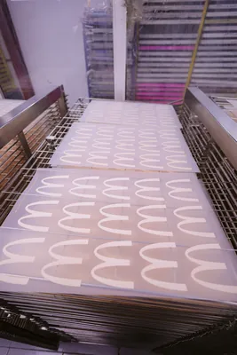 Printed panels on drying rack