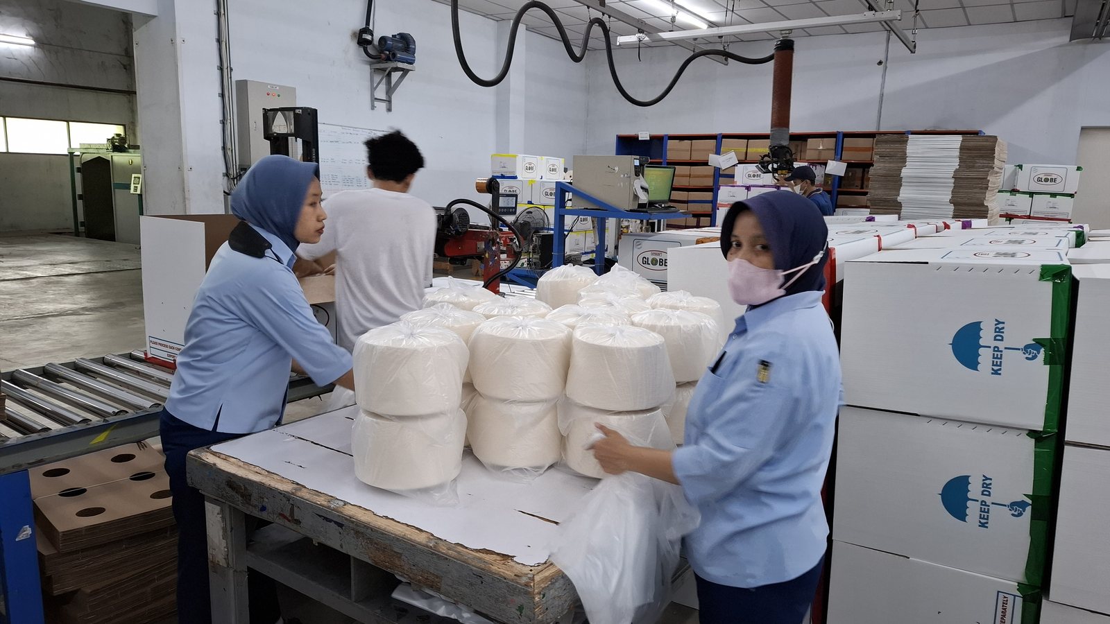 Yarn packing — PT Embee Plumbon Tekstil, Cirebon, Indonesia